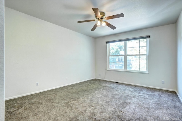1997 E 102nd Cir, Thornton, CO 80229 - carpeted spare room featuring baseboards and ceiling fan