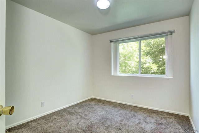 1997 E 102nd Cir, Thornton, CO 80229 - carpeted spare room featuring baseboards