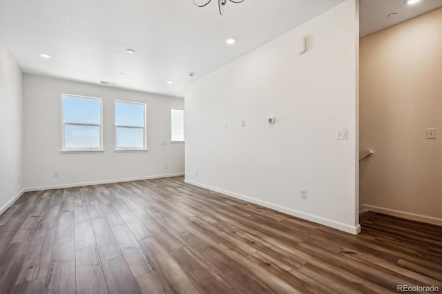 6940 Merseyside Ln, Castle Pines, CO 80108 - empty room with wood finished floors and recessed lighting