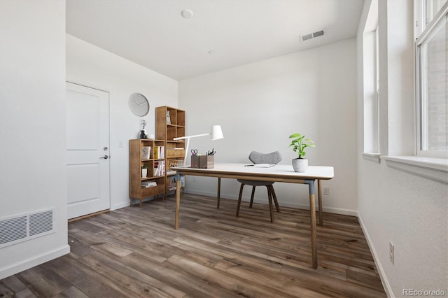 6940 Merseyside Ln, Castle Pines, CO 80108 - office featuring wood finished floors and baseboards