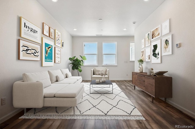 6940 Merseyside Ln, Castle Pines, CO 80108 - living room featuring wood finished floors and recessed lighting