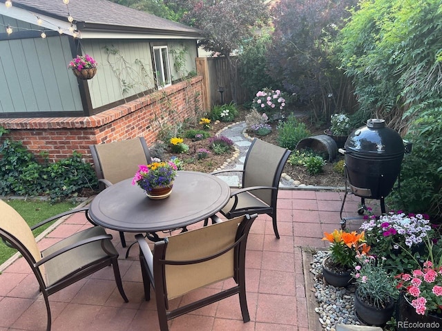 821 S High St, Denver, CO 80209 - view of patio / terrace with outdoor dining area and fence