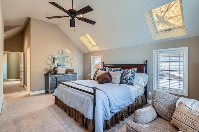 821 S High St, Denver, CO 80209 - bedroom with a skylight, carpet, lofted ceiling, baseboards, and ceiling fan