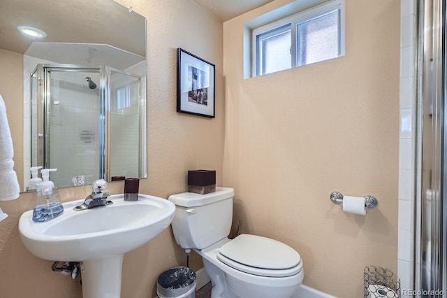 821 S High St, Denver, CO 80209 - full bath featuring a stall shower, toilet, and a sink