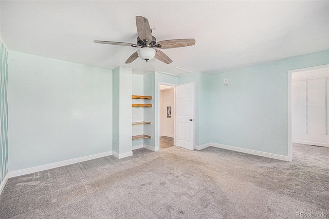 unfurnished bedroom featuring carpet floors, baseboards, and a ceiling fan