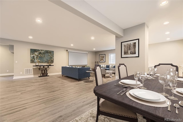 dining room featuring light hardwood / wood-style flooring