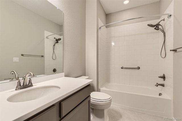 full bathroom with tile patterned flooring, vanity, shower / bath combination, and toilet