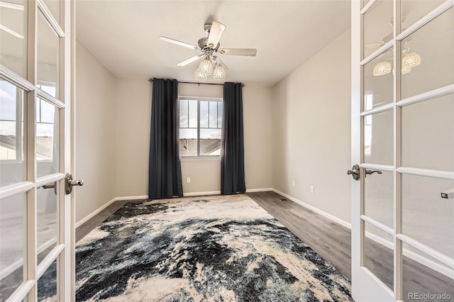 2905 Morningbird Ln, Castle Rock, CO 80109 - unfurnished room with wood finished floors, french doors, and ceiling fan