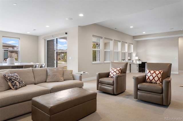 living room featuring light colored carpet