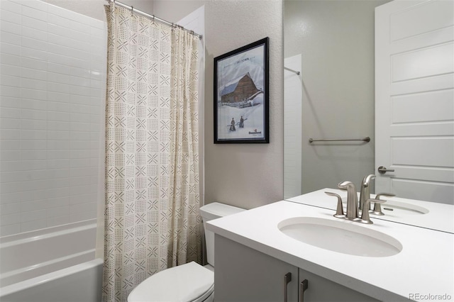 full bathroom featuring shower / bathtub combination with curtain, vanity, and toilet