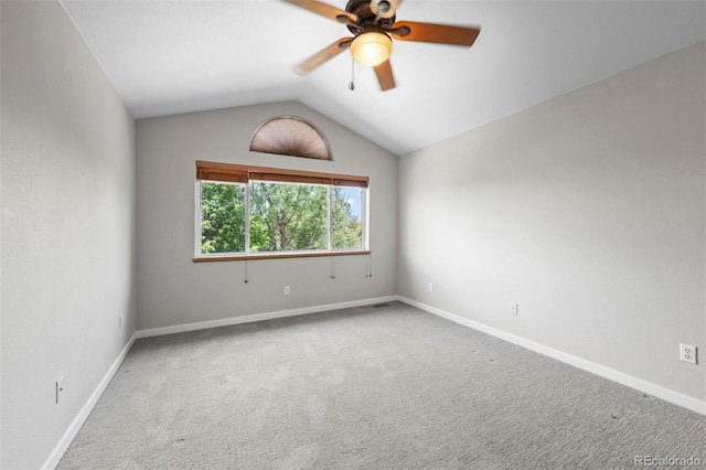 584 Ridgeview Dr, Louisville, CO 80027 - empty room featuring ceiling fan, carpet flooring, vaulted ceiling, and baseboards