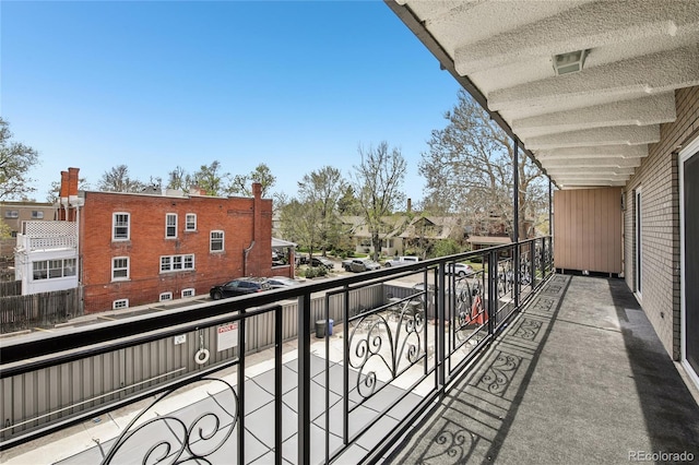 balcony featuring a residential view