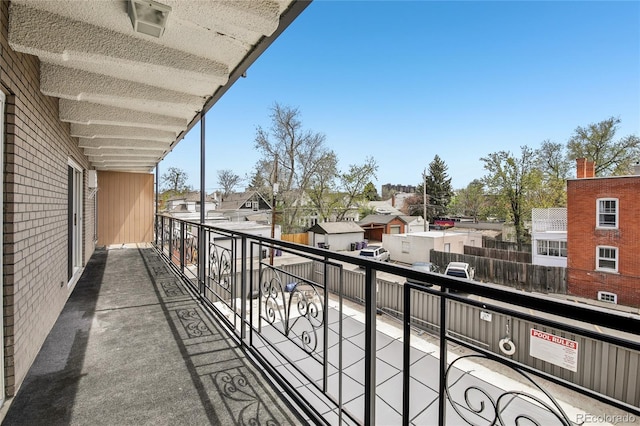 balcony featuring a residential view