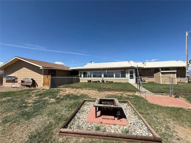 21300 County Road 13, La Jara, CO 81140 - exterior space with a yard, a fenced backyard, and an outdoor fire pit
