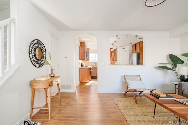 living area featuring light wood-type flooring