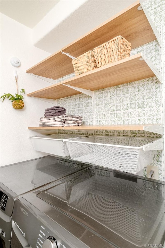 interior space with washer and clothes dryer