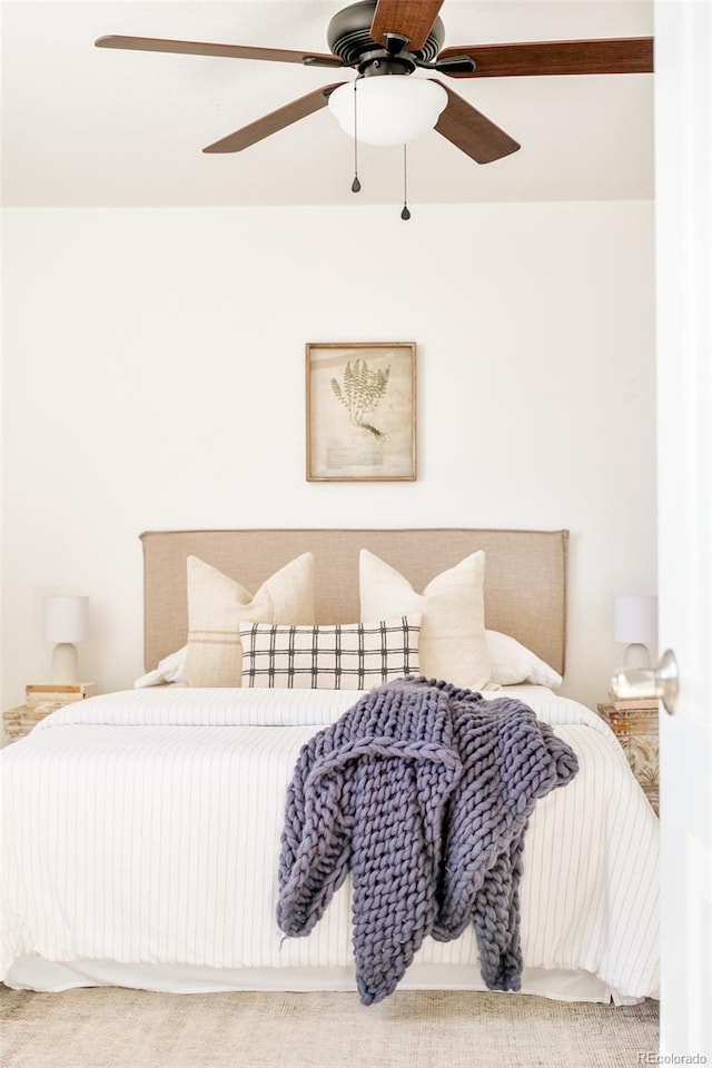 bedroom featuring carpet floors and ceiling fan