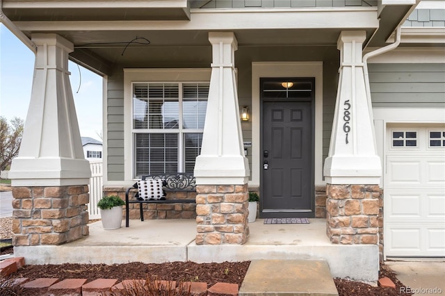 5861 Mt Shadows Blvd, Firestone, CO 80504 - doorway to property featuring covered porch