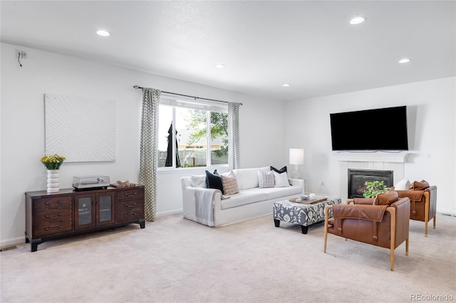 5861 Mt Shadows Blvd, Firestone, CO 80504 - living area with light colored carpet, recessed lighting, a fireplace, and baseboards
