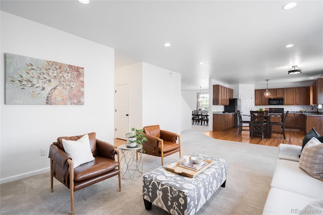 5861 Mt Shadows Blvd, Firestone, CO 80504 - living room with light colored carpet, recessed lighting, and baseboards