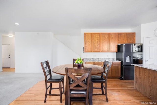 5861 Mt Shadows Blvd, Firestone, CO 80504 - dining space featuring light wood-type flooring and recessed lighting