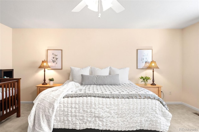 5861 Mt Shadows Blvd, Firestone, CO 80504 - bedroom with light colored carpet, baseboards, and ceiling fan