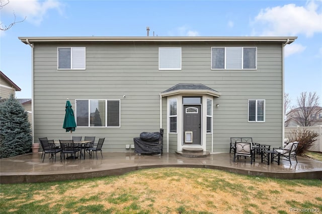 5861 Mt Shadows Blvd, Firestone, CO 80504 - rear view of house featuring a patio