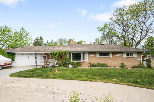 9045 W Ithaca Pl, Denver, CO 80235 - ranch-style house featuring a garage, driveway, a chimney, a front yard, and brick siding