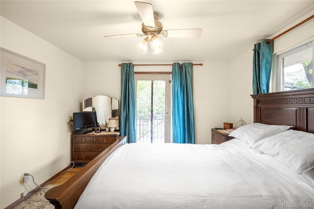 9045 W Ithaca Pl, Denver, CO 80235 - bedroom with access to exterior, multiple windows, a ceiling fan, and baseboards