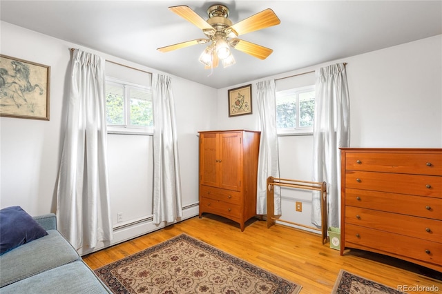 9045 W Ithaca Pl, Denver, CO 80235 - bedroom with light wood-style flooring and ceiling fan