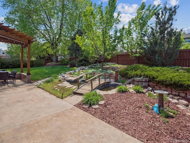 view of yard with a patio and a pergola