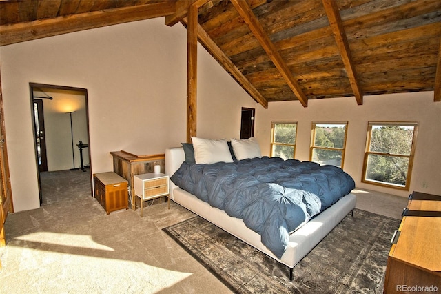 bedroom featuring dark colored carpet, lofted ceiling with beams, and wood ceiling