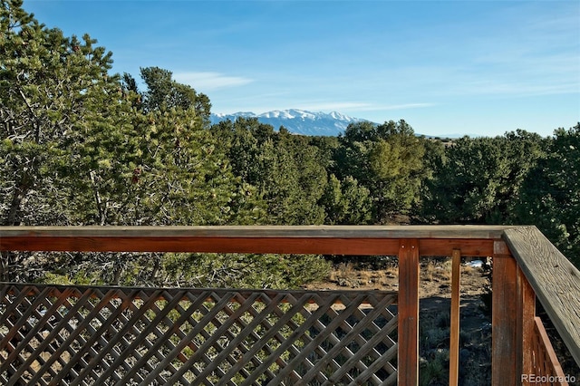 wooden terrace featuring a mountain view