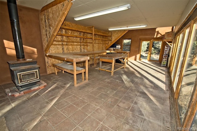 interior space featuring a wood stove