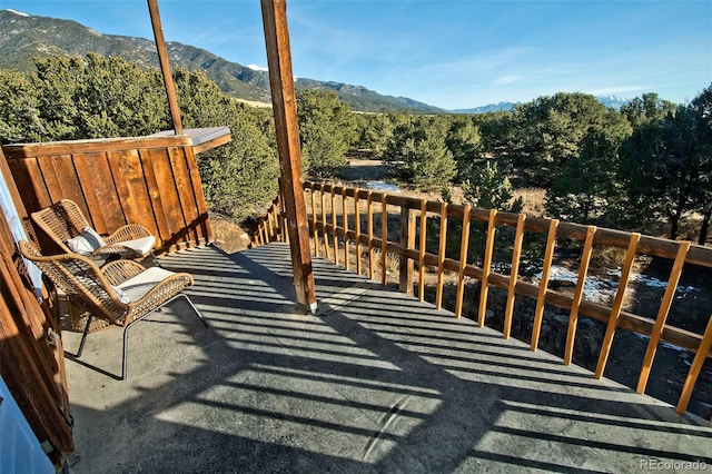 balcony featuring a mountain view