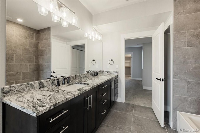 bathroom with vanity and tile patterned floors