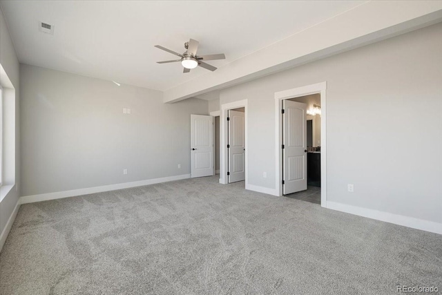 unfurnished bedroom with light colored carpet