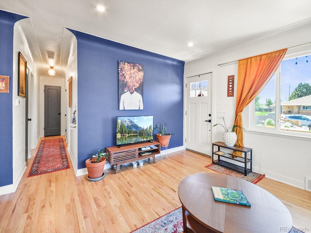 3450 N Harrison St, Denver, CO 80205 - living room with recessed lighting, baseboards, and wood finished floors