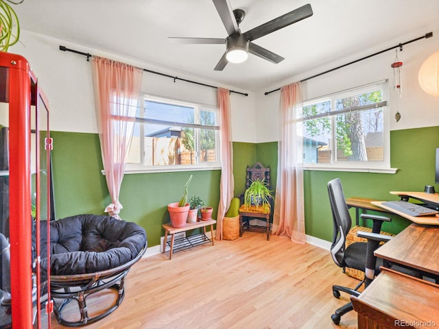 3450 N Harrison St, Denver, CO 80205 - office area with plenty of natural light, wood finished floors, baseboards, and ceiling fan