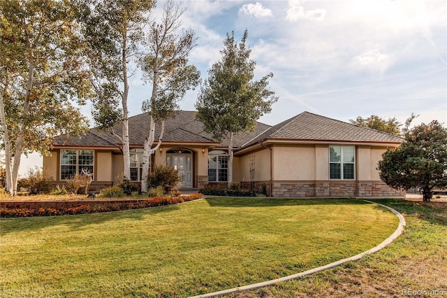 ranch-style house with a front lawn