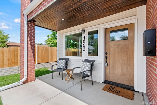 1048 Knox Ct, Denver, CO 80204 - doorway to property with brick siding