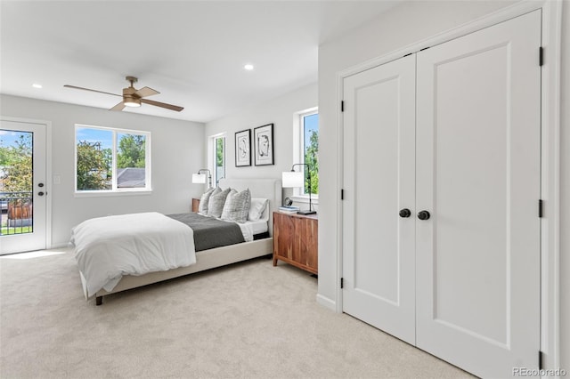 1048 Knox Ct, Denver, CO 80204 - bedroom featuring light colored carpet, access to outside, recessed lighting, and ceiling fan