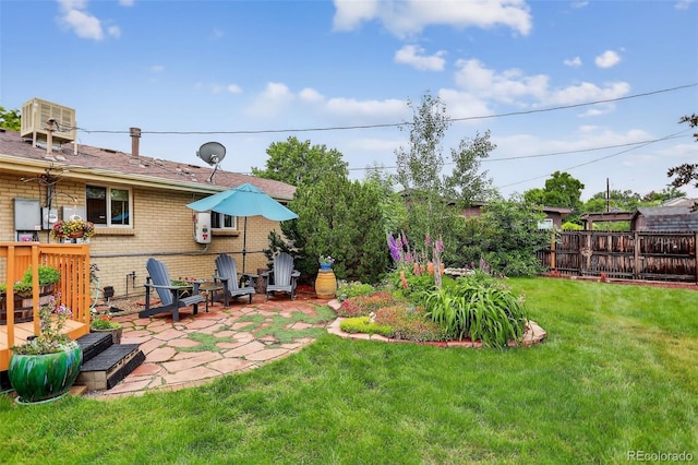 11835 W 37th Pl, Wheat Ridge, CO 80033 - view of yard featuring a patio area