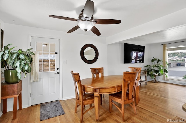 11835 W 37th Pl, Wheat Ridge, CO 80033 - dining space with light wood finished floors and a ceiling fan