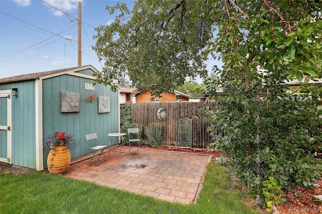 11835 W 37th Pl, Wheat Ridge, CO 80033 - view of patio / terrace with a storage shed
