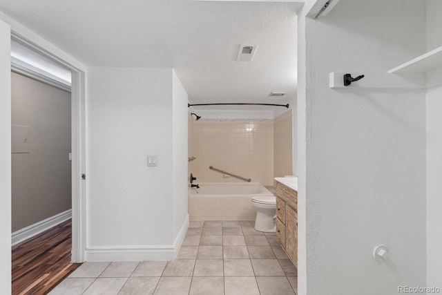 bathroom with shower / bathtub combination, tile patterned flooring, toilet, vanity, and visible vents