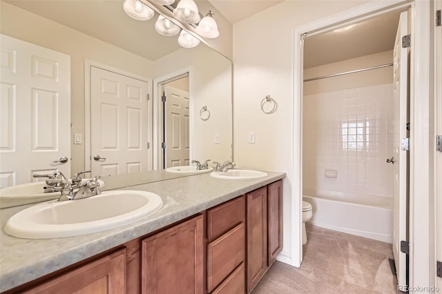 full bathroom with vanity, shower / bathtub combination, and toilet