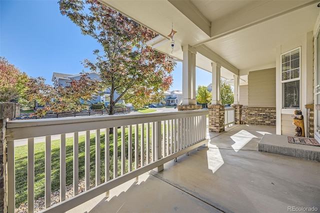 balcony featuring a porch