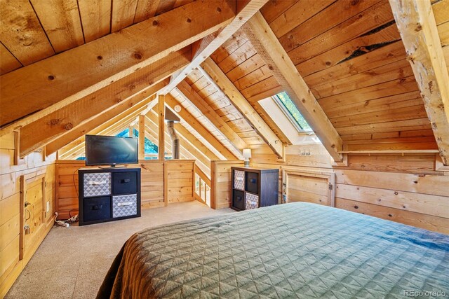 unfurnished bedroom featuring vaulted ceiling with skylight, wood ceiling, wood walls, and light carpet