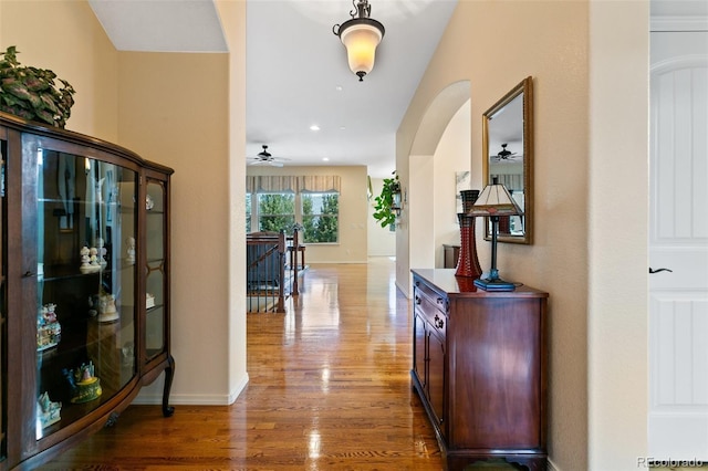 hallway with wood-type flooring